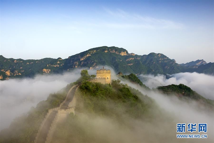 这是5月13日拍摄的天津市蓟州区黄崖关长城雨后云海壮美景观。新华社发(杨玉山摄)