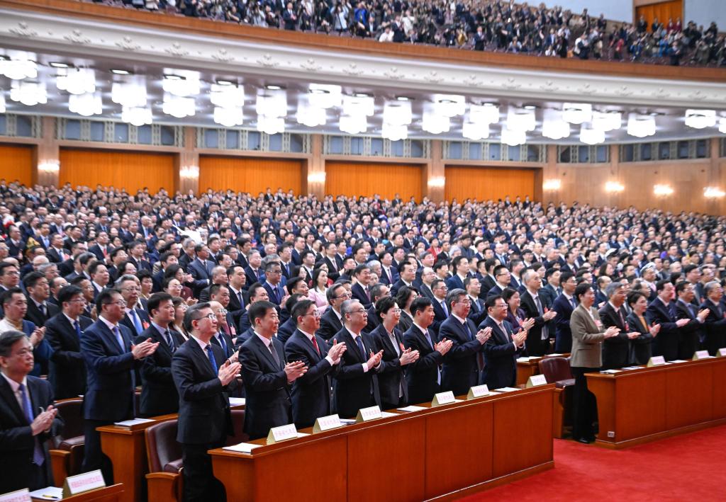 3月8日，十四届全国人大三次会议在北京人民大会堂举行第二次全体会议。 新华社记者 申宏 摄